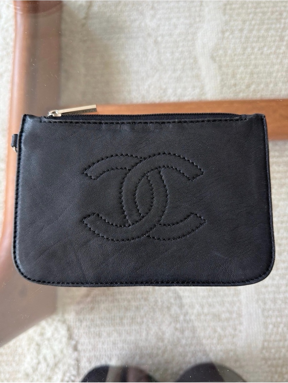 CHANEL CC Black Leather Zip Wallet with Branded Silver Pull.